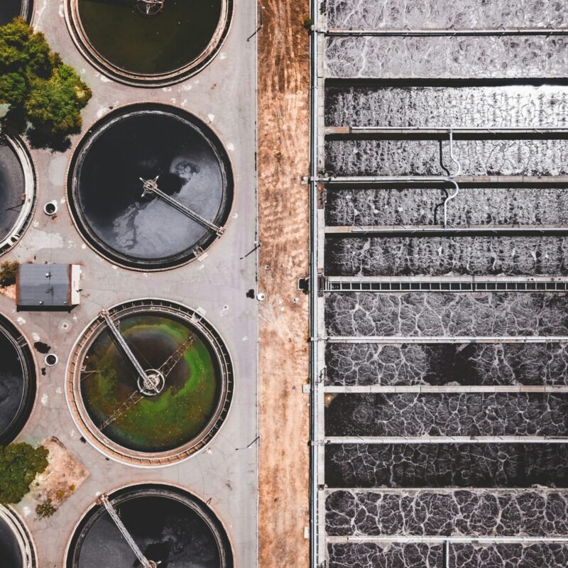 an overhead view of a street with a lot of water